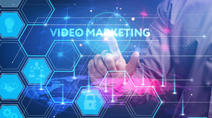 Business, Technology, Internet and network concept. Young businessman working on a virtual screen of the future and sees the inscription: