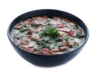 Delicious cold okroshka with kvass isolated on white. Traditional Russian summer soup