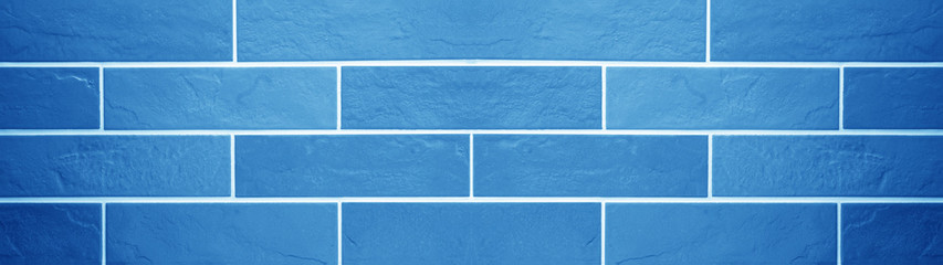 Abstract blue colored brick tiles wall texture wide background banner panorama
