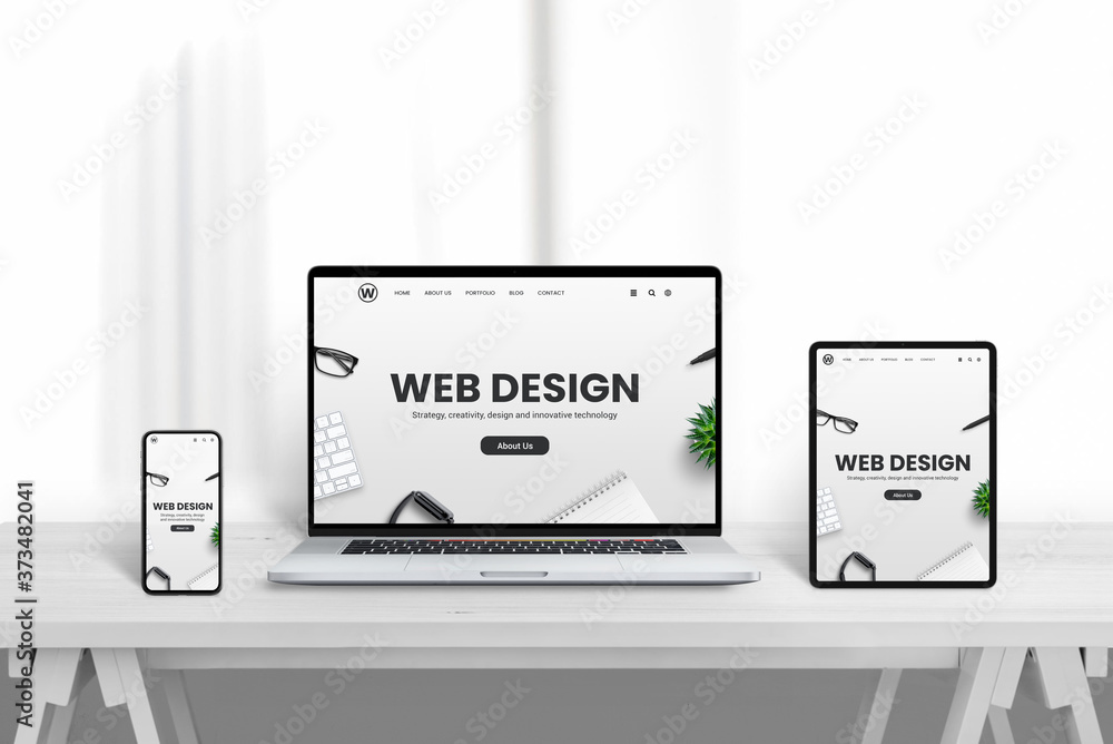 Wall mural web design company web site promotion od different devices. white wooden desk with clean background