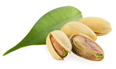 Pistachios and a green leaf