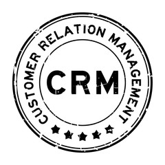 Grunge black CRM Customer Relationship Management word round rubber seal stamp on white background