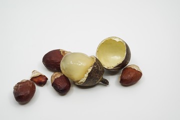 Peelde of matoa fruit (pomalia pinnata) from Indonesia or matoa fruit with seeds on a white background