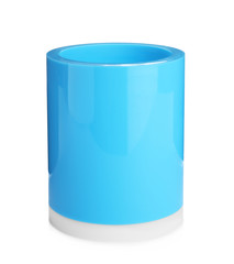 Light blue plastic holder isolated on white. Stationery for school