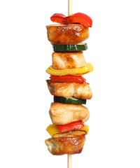 Delicious chicken shish kebab with vegetables on white background