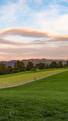 Riding a bike while sun is setting