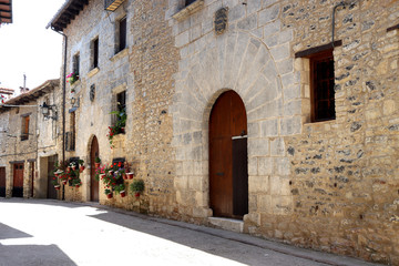 CANTAVIEJA, SPAIN - 24 OF JUNE 2020: Picturesque typical medieval house of cantavieja in the province of teruel, spain