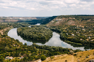 Fototapeta na wymiar Beautiful view over a landscape of Dniester river with a heart-shaped island in the middle.