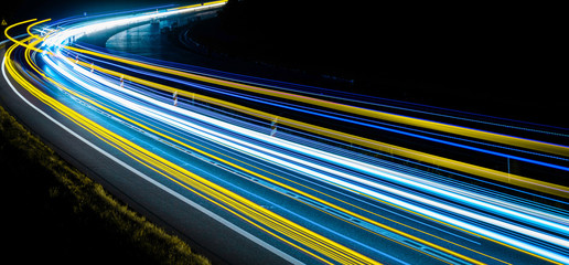 abstract blue and yellow car lights at night © Krzysztof Bubel