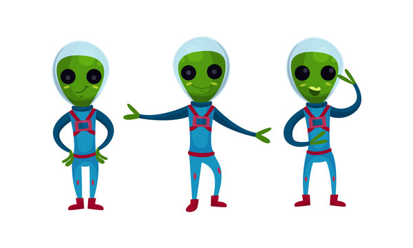 Green Alien Creatures In Spacesuit Standing And Waving Hand Vector Set