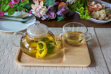 Traditional herbal tea with lemon, chamomile flowers and mint. Herbal tea with mint and chamomile....