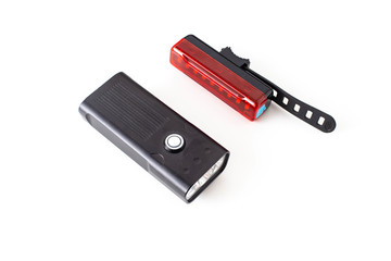 Bicycle lighting kit. Headlight and brake light for safety and illumination in the dark, white background, isolate