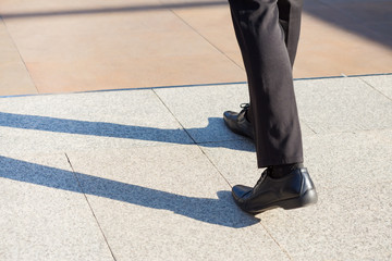 Businessman step forward also has a shadow on the floor.