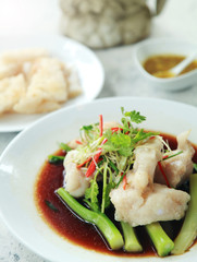stream sea bass fillet with soy sauce. Thai food.