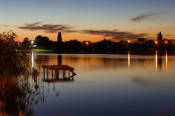 Naklejka premium Ukraine, evening, beautiful sunset on the lake