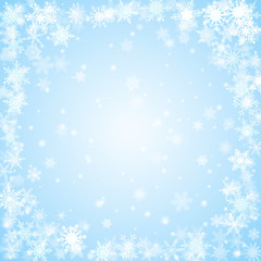 Fototapeta na wymiar Christmas background of snowflakes arranged in a circle, in light blue colors