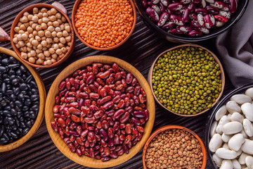 Fresh organic natural beans on wooden rustic background