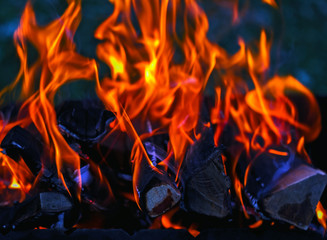 Red flames on wood