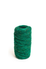 A skein of green twine on a white background. Isolate