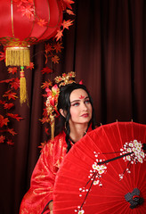 a woman in red Chinese national traditional costume. Chinese woman with hairpins in her hair.
girl with umbrella

red Chinese lantern
