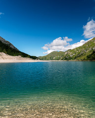 View of Fedaia lake at Fedaia pass in Italy