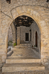 Obraz na płótnie Canvas A narrow street among the old houses of Vallecorsa, a medieval village in the lazio region.