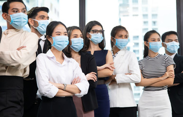 Obraz na płótnie Canvas group of diversity business people wearing protective medical masks for protection from virus in office