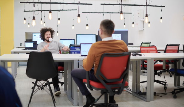 friends at office playing with stress control ball