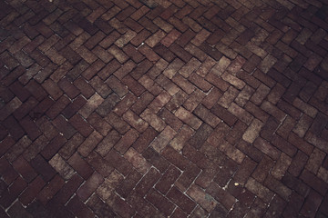 Ancient of pattern dark and light tone brick floor pavement stones