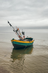 Wooden fishing boat in Baltic Sea in Poland