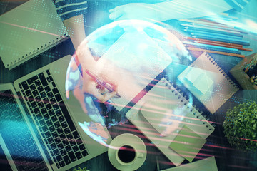 Tech theme hologram over woman's hands taking notes background. Concept of hightech. Double exposure