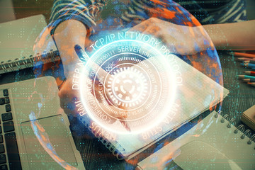 Tech theme hologram over woman's hands taking notes background. Concept of hightech. Double exposure