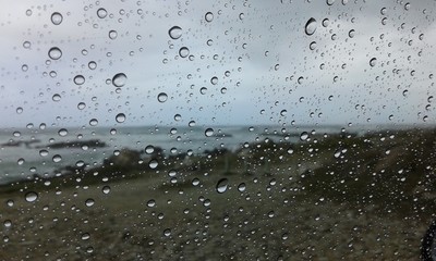 A view from the backseat of my mom's Chevrolet Optra of the rainy yet beautiful weather of Cape Agulhas, South Africa 