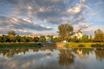 Fototapeta na wymiar Preobrazhensky park in the city of Abakan. View of the Transfiguration Cathedral. The Republic of Khakassia. Russia.