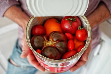 Vegetables in a basket. Tomato harvest in basket.