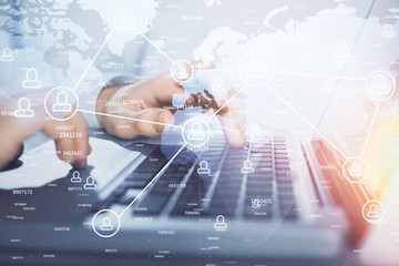 Social network theme hologram with businessman working on computer on background. Concept of world wide web. Double exposure.