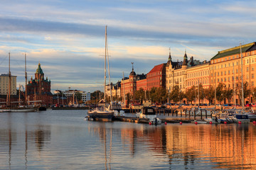 Fototapeta na wymiar Amazing sunrise cityscape in North Harbour, Pohjoissatama, Helsinki downtown, Finland, Uspenskin kathedral