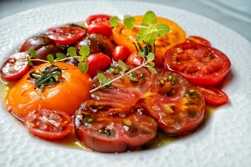 Tomato and mozzarella. Tomato carpaccio.
