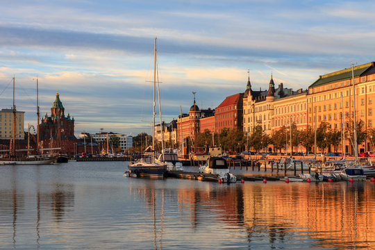 Amazing sunrise cityscape in North Harbour, Pohjoissatama, Helsinki downtown, Finland, Uspenskin kathedral