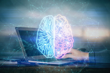 Man typing on keyboard background with brain hologram. Concept of big Data. Double exposure.