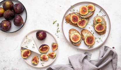 Bruschetta with camembert cheese  and fig slices. Top view