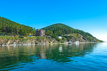 Fototapeta na wymiar The village of Listvyanka is located on the shore of Lake Baikal is the popular tourist center on Lake Baikal.