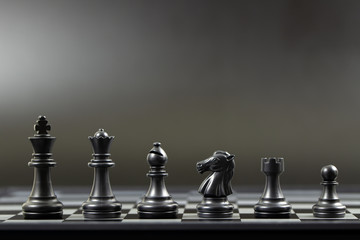 Black chess pieces on the board for business strategy planning concept
