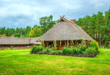 Fototapeta na wymiar old wooden houses near Riga, Latvia