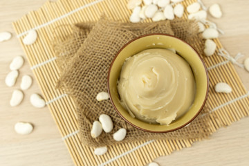 Fototapeta na wymiar Japanese shiroan or white bean paste in a bowl, the filling used to make mochi and wagashi