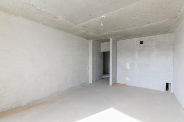 Russia, Moscow- February 10, 2020: interior room rough repair for self-finishing. interior decoration, bare walls of the premises, stage of construction