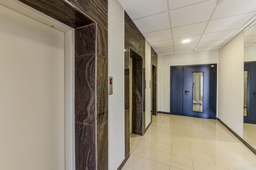 Russia, Moscow- February 10, 2020: interior public place, house entrance. doors, walls, staircase corridors.