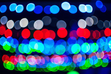 colorful circular bokeh of lights on the colored abstract background