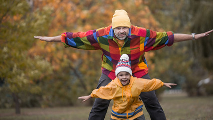 Tender scene father with son having fun spending tome together