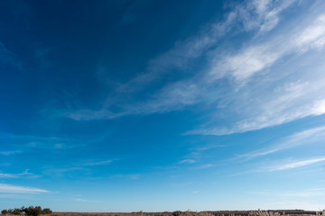 Clear sky in daytime, worm and fluffy clouds, sunny day, spring time